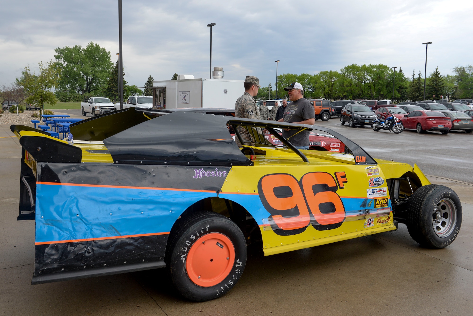 Eric Folstad, driver of the 96F racecar, visited Minot Air Force Base, N.D., May 25, 2016. Folstad displayed his car at the Base Exchange for a giveaway and to inform Airmen about Military Appreciation Day on May 30. (U.S. Air Force photo/Airman 1st Class Jessica Weissman)
