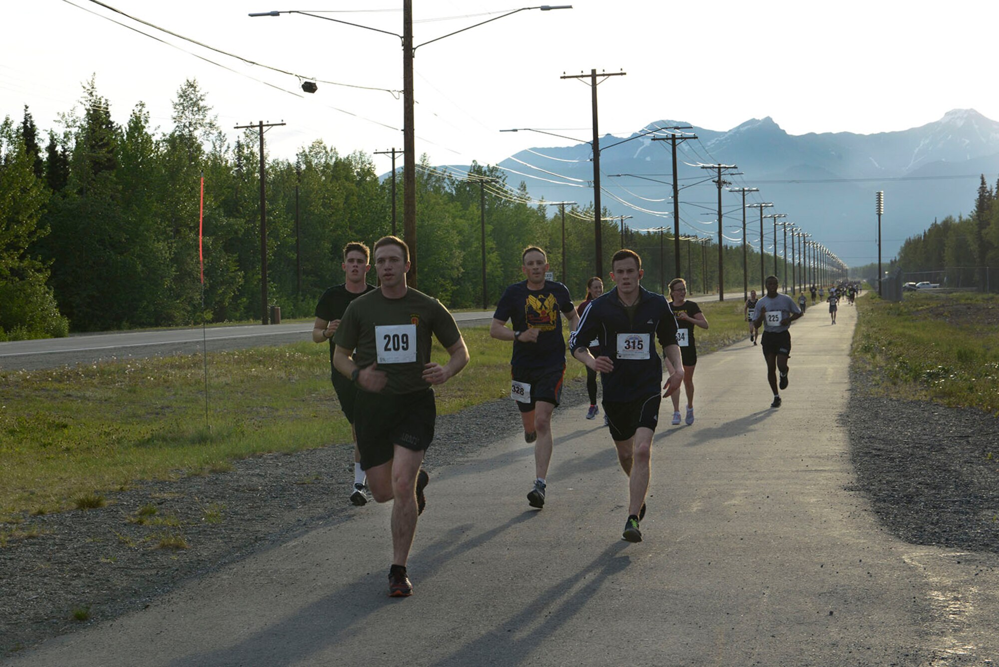 Airmen and Soldiers participate in an Army 10-miler qualifier at Joint Base Elmendorf Richardson, Alaska, May 26, 2016. The top finishers were selected to represent U.S. Army Alaska at the Army 10-miler in Washington D.C. Oct. 9, 2016. (U.S. Air Force photo by Airman 1st Class Valerie Monroy)