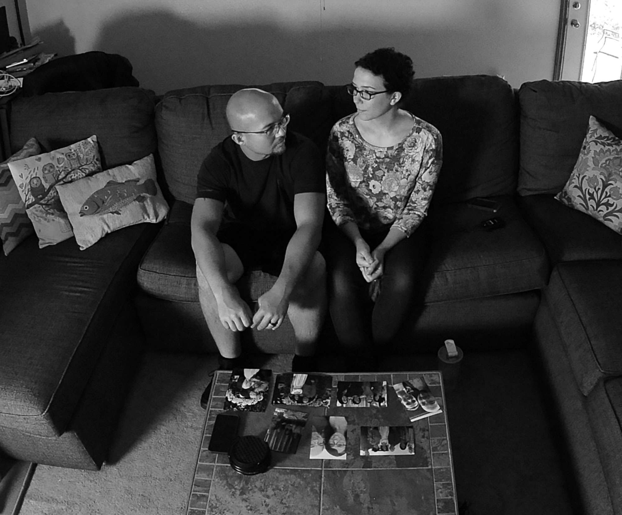 U.S. Air Force Staff Sgt. Lauren Palmer, a 509th Aircraft Maintenance Squadron commander support staff personnel craftsman, right, and her husband, David Roberts, reminisce on past trials and triumphs May 13, 2016. The couple told their story about the journey after Palmer was diagnosed with Hodgkin’s lymphoma in October 2014. (U.S. Air Force photo by Airman 1st Class Michaela R. Slanchik)