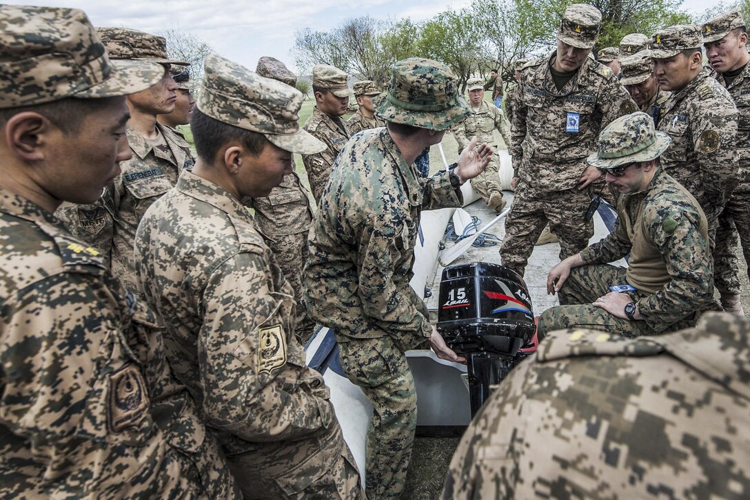 U.S. Marines teach Mongolian forces how to safely operate a combat rubberized raid craft during small boat training as part of Khaan Quest 2016 in Ulaanbataar, Mongolia, May 30, 2016. Navy photo by Petty Officer 3rd Class Markus Castaneda