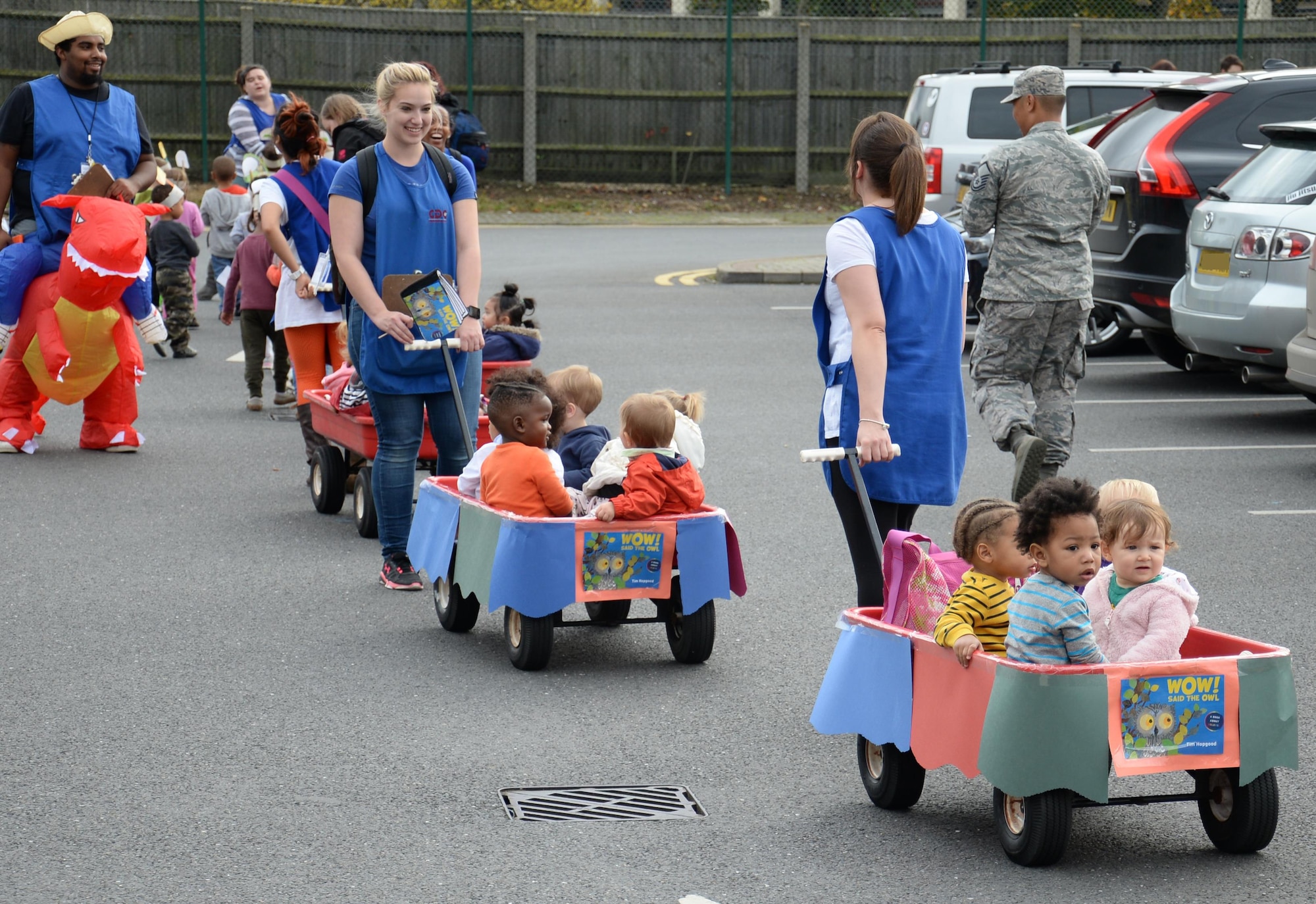 Team Mildenhall children take part in a parade during a Fall Festival Oct. 28, 2016, at the child development center on RAF Mildenhall, England. Children of all ages and their parents took time to come together to celebrate fall. (U.S. Air Force photo by Gina Randall)