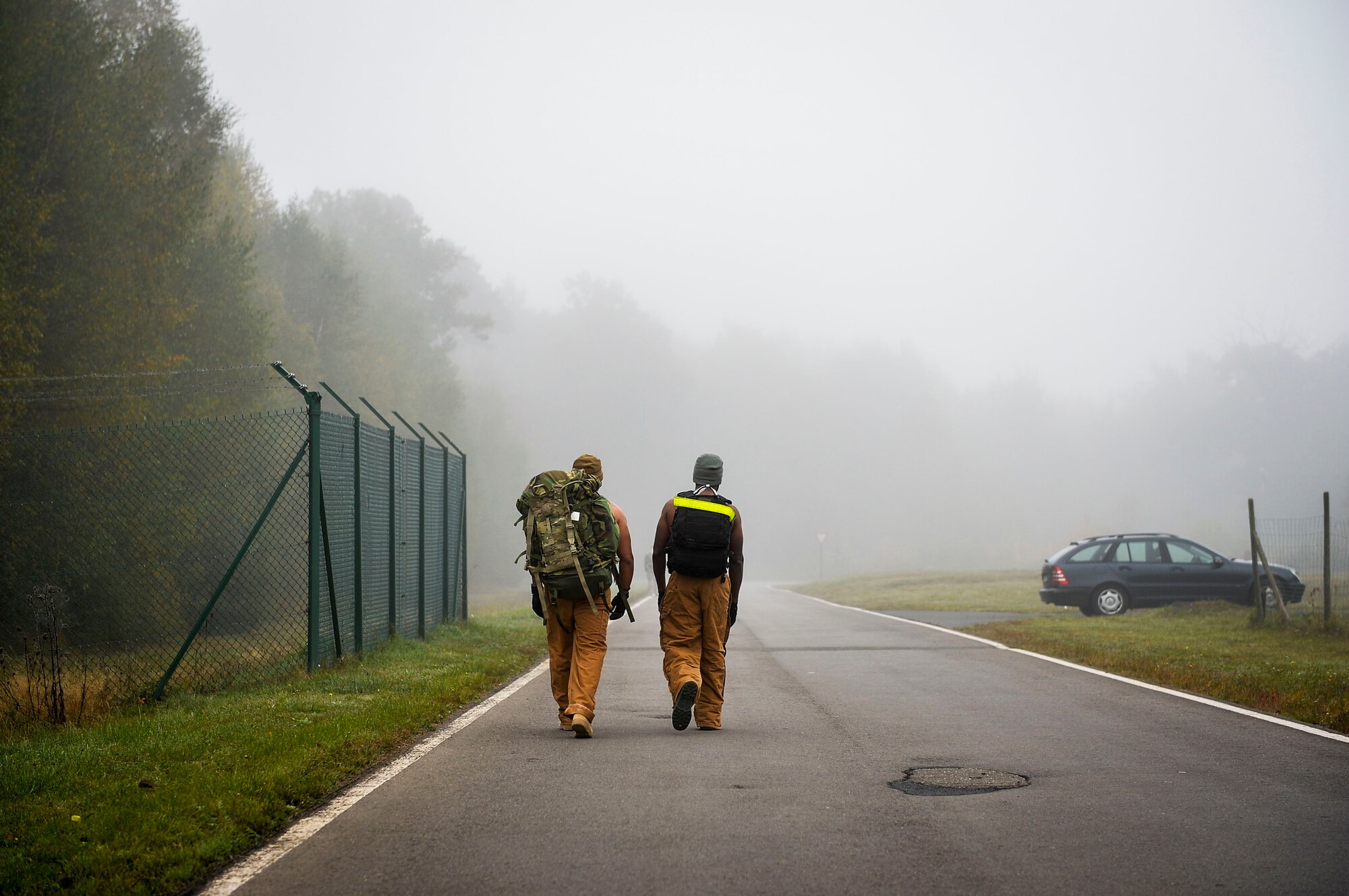 786th Civil Engineer Squadron supervisor Staff Sgt. Israel Ortiz, left, participates in a ruck and run event with Staff Sgt. Berron Johnson, 786th CES NCO in charge of structures at Ramstein Air Base, Germany, Oct. 28, 2016. The 786th CES’s explosive ordnance disposal flight conducts monthly ruck marches which are open to participation from any unit on Ramstein. (U.S. Air Force photo by Airman 1st Class Joshua Magbanua)