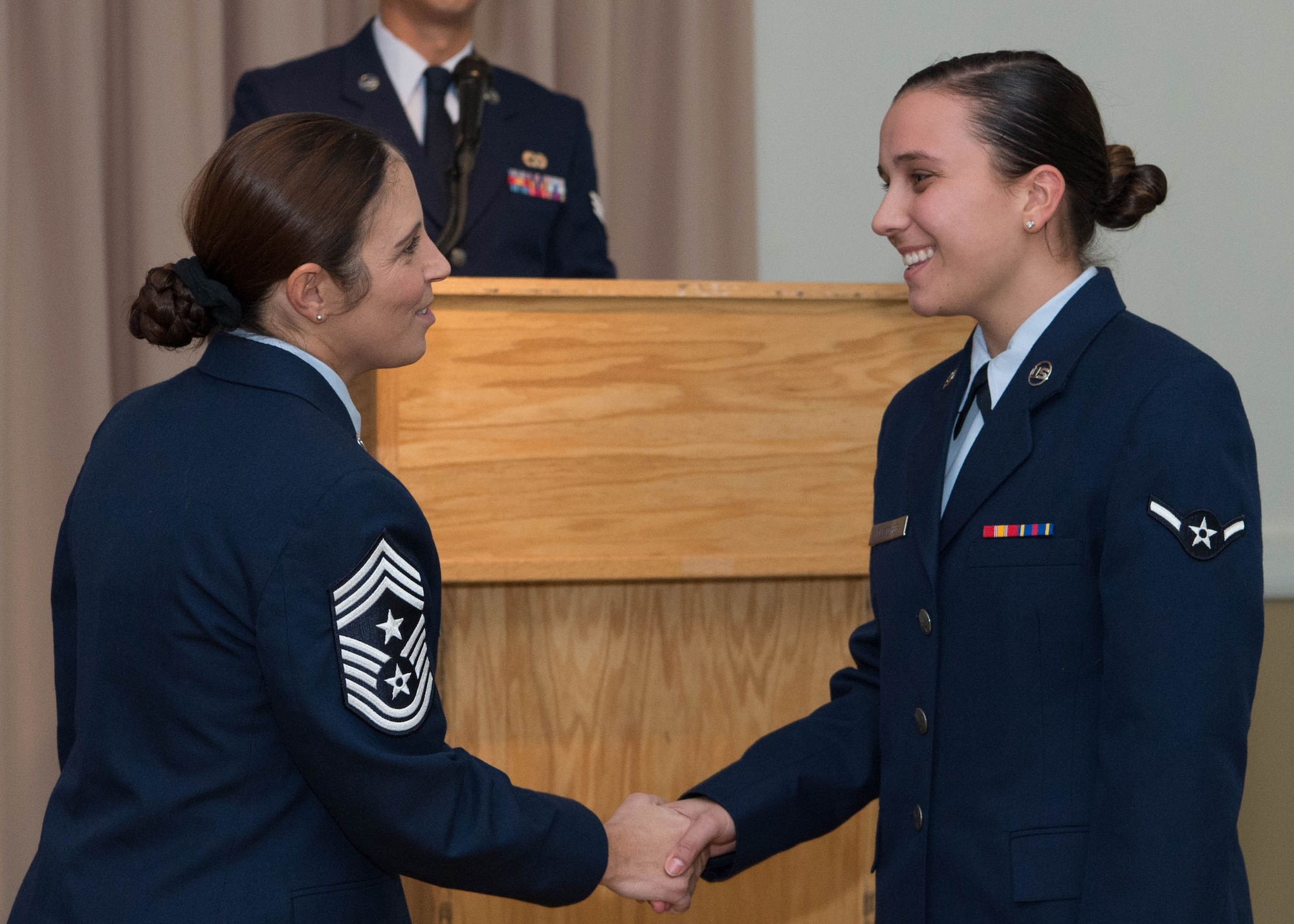 Hanscom Command Chief Master Sgt. Patricia L. Hickey congratulates Airman Kassidi E. Fletcher, a dental technician at the 66th Medical Squadron, during the monthly enlisted promotion ceremony at the Minuteman Commons Oct. 31. The monthly promotion ceremony, generally held the last duty day of the month, provides the Hanscom community an opportunity to recognize enlisted Airman selected for promotion. (U.S. Air Force photo by Jerry Saslav)