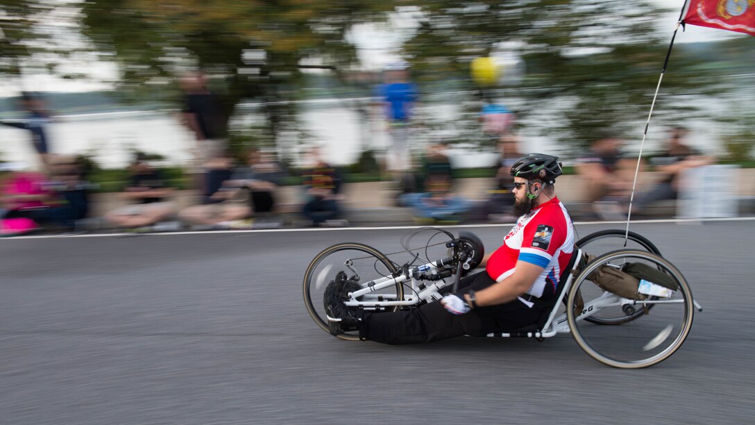 A hand cyclist peddles past the 9-mile marker as part of the 41st Marine Corps Marathon, Oct. 30, 2016. The MCM is a 26.2-mile course that runs through Washington, D.C. and Northern Virginia. The Marine Corps Marathon is also known as “The People’s Marathon.”