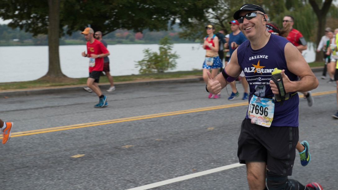 Runners past 9-mile marker as part of the 41st Marine Corps Marathon, Oct. 30, 2016. The MCM is a 26.2-mile course that runs through Washington, D.C. and Northern Virginia. The Marine Corps Marathon is also known as “The People’s Marathon.”