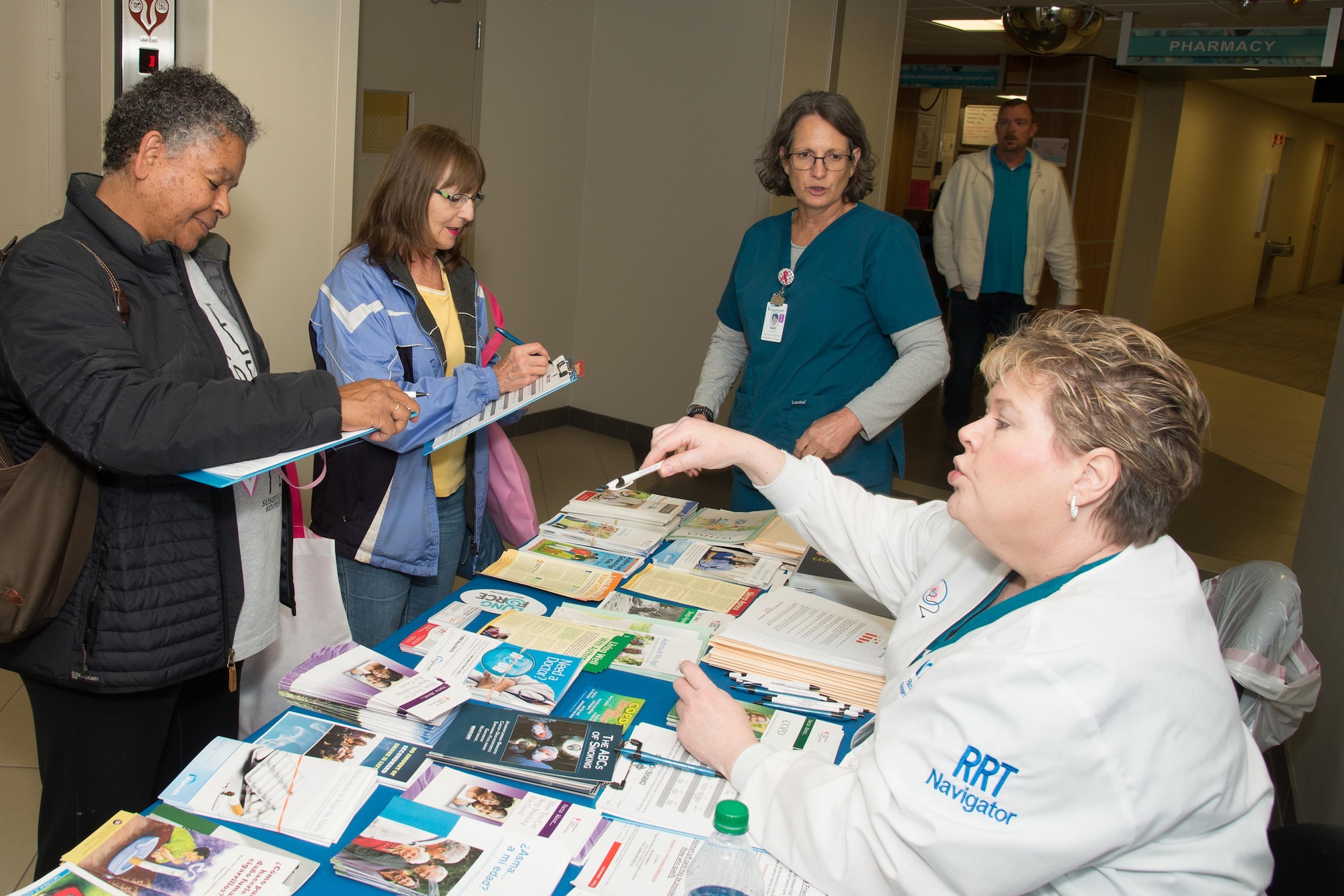Elizabeth Hurley, Bay Health Medical Center registered respiratory therapist, conducts a lung assessment screening during the Health Fair hosted by the 436th Medical Group Oct. 28, 2016, on Dover Air Force Base, Del. The screenings help rule out the risk for chronic obstructive pulmonary disease. (U.S. Air Force photo by Mauricio Campino