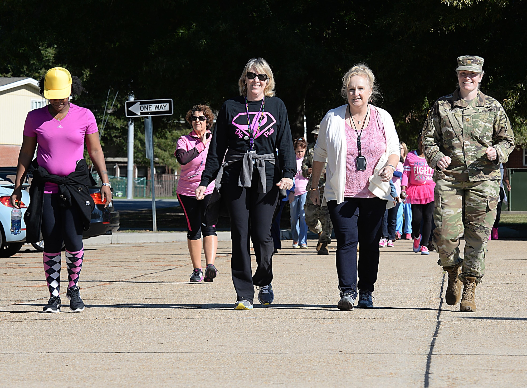 Members of the Joint Base Langley-Eustis community participate in the Breast Cancer Awareness Month walk at JBLE, Va., Oct. 28, 2016. This annual walk brings together members of the installation to raise awareness of the importance of breast cancer early detection methods, such as mammograms and self breast exams. (U.S. Air Force photo by Staff Sgt. Teresa J. Cleveland)