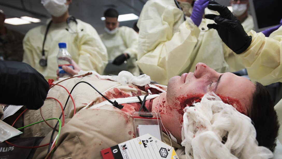 U.S. Army Sgt. Seth Pilkington, 233rd Military Police Company, acts as a patient during a mass casualty exercise Oct. 30, 2016 in the emergency room of the Craig Joint Theater Hospital, Bagram Airfield, Afghanistan. Patients were medically evacuated from the embassy in Kabul for the exercise. (U.S. Air Force photo by Staff Sgt. Katherine Spessa)
