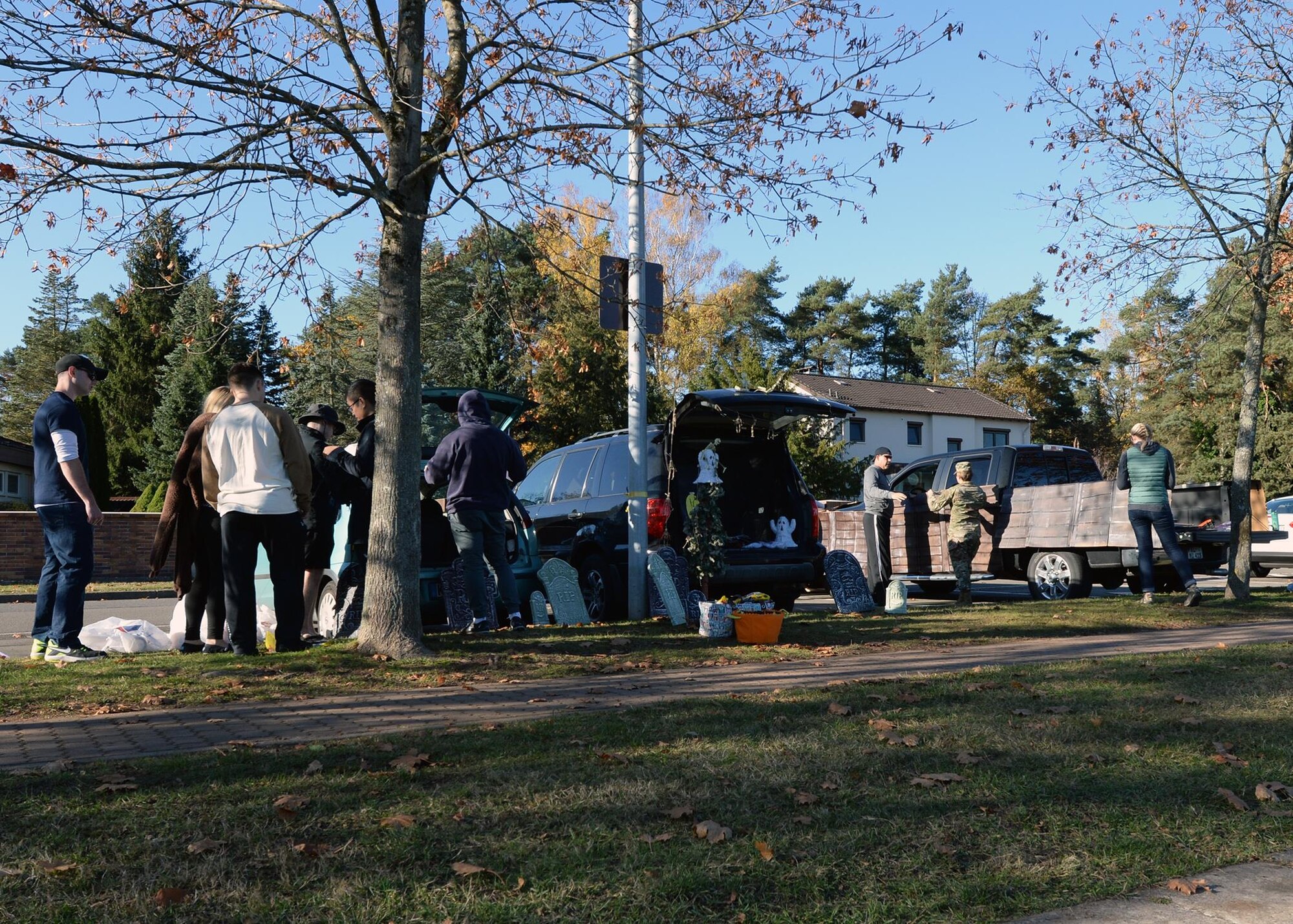 Volunteers from the Kaiserslautern Military Community set-up their trunks for the annual Trunk or Treat event at Ramstein Air Base, Germany, Oct. 31, 2016. Fifty-nine spots were rented out to be decorated for the event. (U.S. Air Force photo by Senior Airman Jimmie D. Pike)