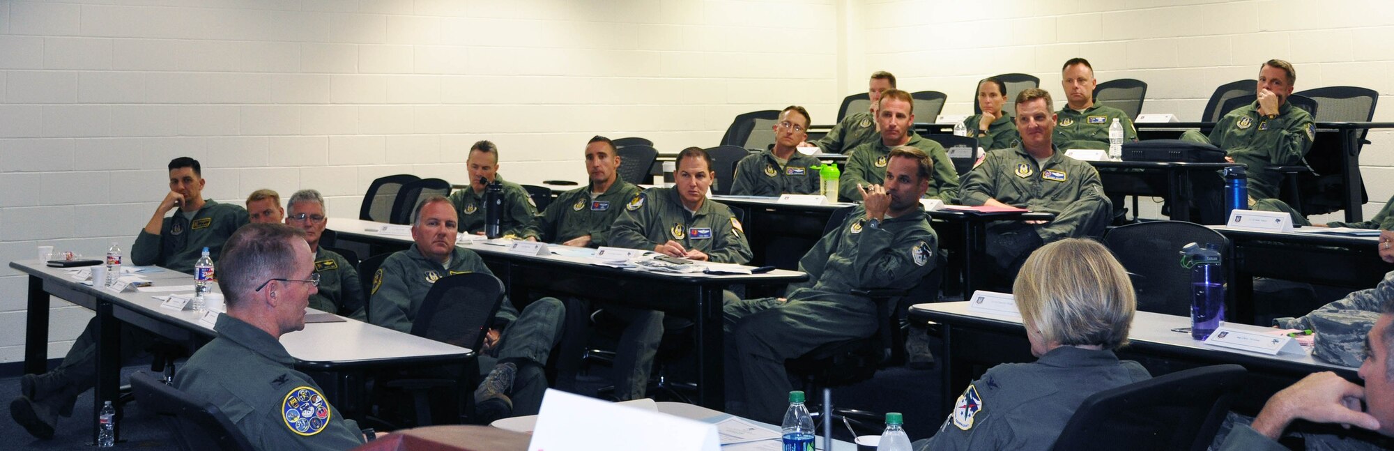 Col. Roger Suro, 340th Flying Training Group commander, briefs commanders at the Group's annual fall commanders summit at Joint Base San Antonio-Randolph, Texas. Photo by Janis El Shabazz
