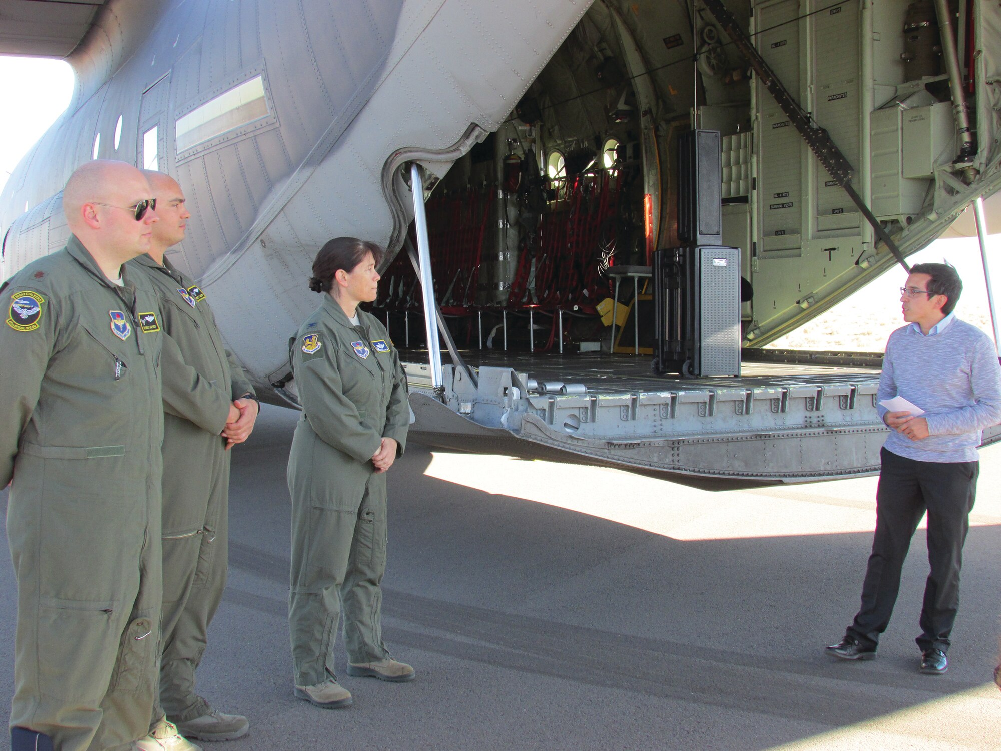 From left, MC-130J pilots Maj. Dennis Napier and Capt. Brett Agatep, and 58th Special Operations Wing Commander Col. Brenda Cartier listen as Belen Mayor Jerah Cordova welcomes them to the Belen Alexander Municipal Airport, where aircrews can train under a new joint-use agreement. Napier and Agatep are the first pilots to fly into the airport under the agreement. (Photo by Argen Duncan)