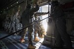 U.S. Army Alaska Soldiers assigned to the 4th Infantry Brigade Combat Team (Airborne), 25th Infantry Division, prepare to jump out of a C-17 Globemaster III during a formation flight from Joint Base Elmendorf-Richardson (JBER), Oct. 19, 2016. Although not instrumental in the creation of airborne operations, JBER has played a significant role in its continued development when the 4th Infantry Brigade Combat Team (Airborne), 25th Infantry Division was created in 2005 as the only airborne BCT in the Pacific theater.