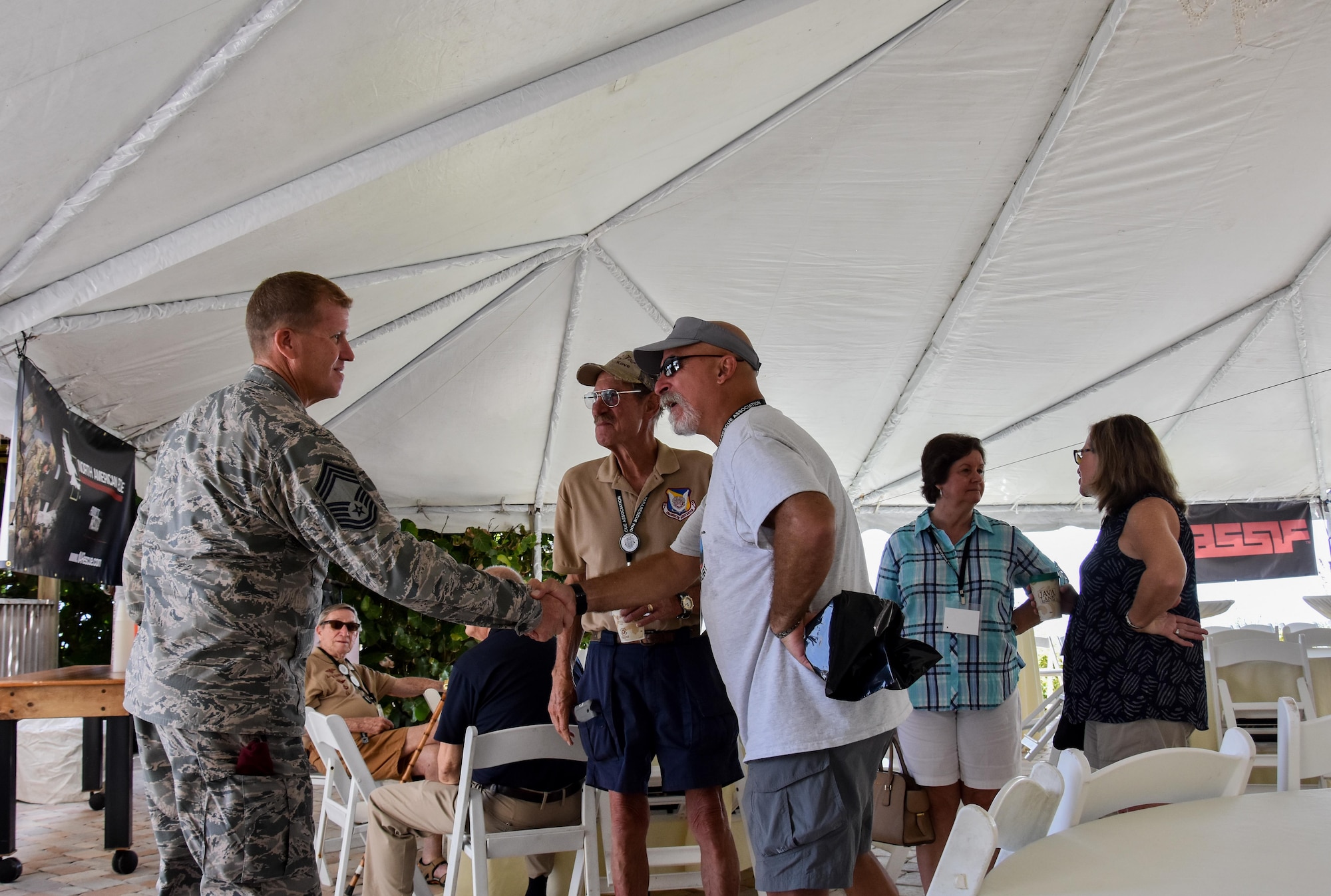 Retired Col. Kurt Buller, former special tactics officer, delivers remarks as the guest speaker during the 2016 Pararescue Reunion in Melbourne, Florida, September 23, 2016. The reunion brought in more than 600 retired and currently-serving PJs and their families to the beaches near Patrick Air Force Base, Florida. (U.S. Air Force photo/ Staff Sgt. Dana White) 