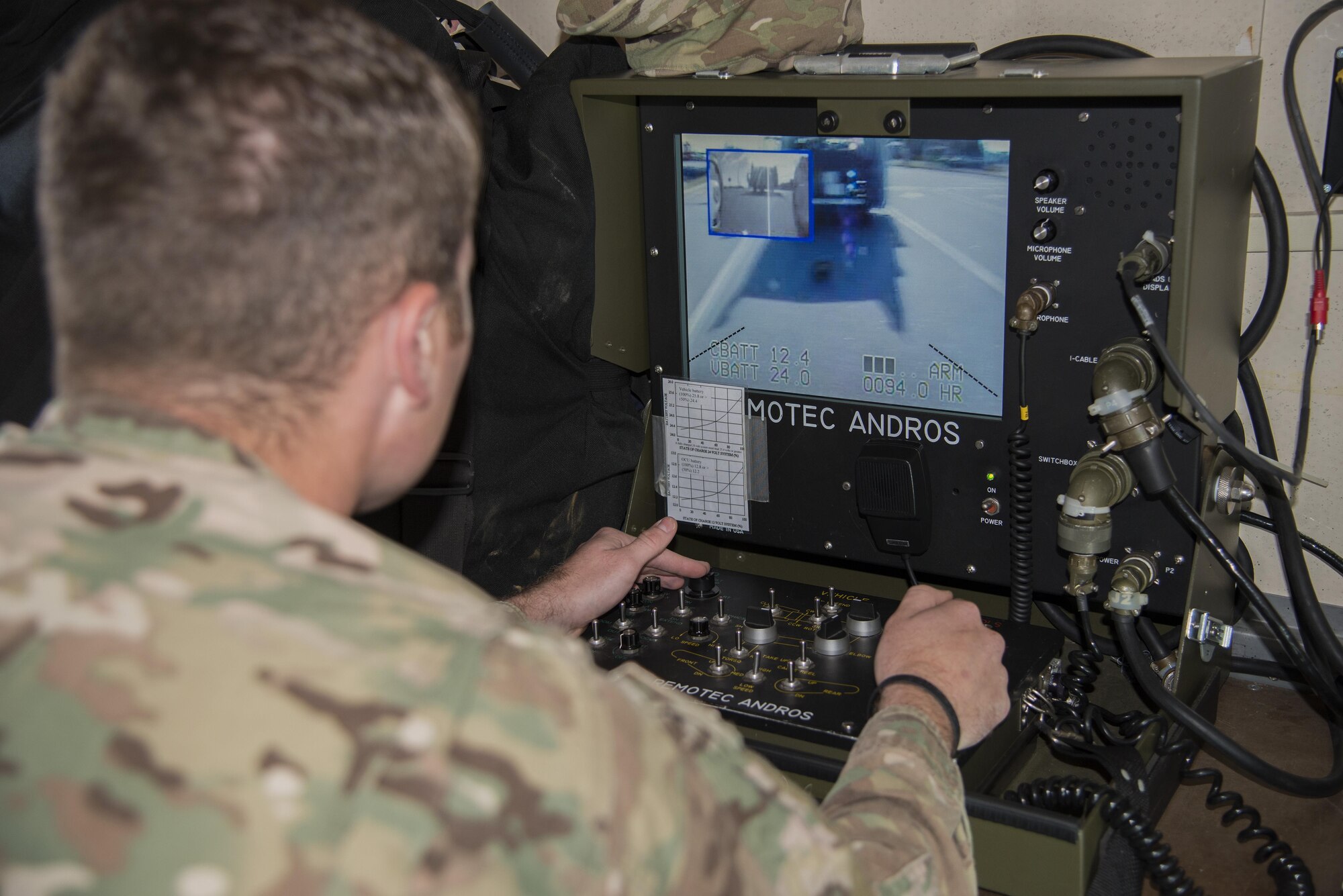 Senior Airman Joel Miller, 436th Civil Engineer Squadron explosives ordnance disposal journeyman, operates an F-6 EOD robot during a simulated radiological attack Oct. 26, 2016, at the south gate of Dover Air Force Base, Del. The simulated attack was the capstone event of a three-day Force Protection and Major Accident Response Exercise held Oct. 24 – 26. (U.S. Air Force photo by Senior Airman Aaron J. Jenne)