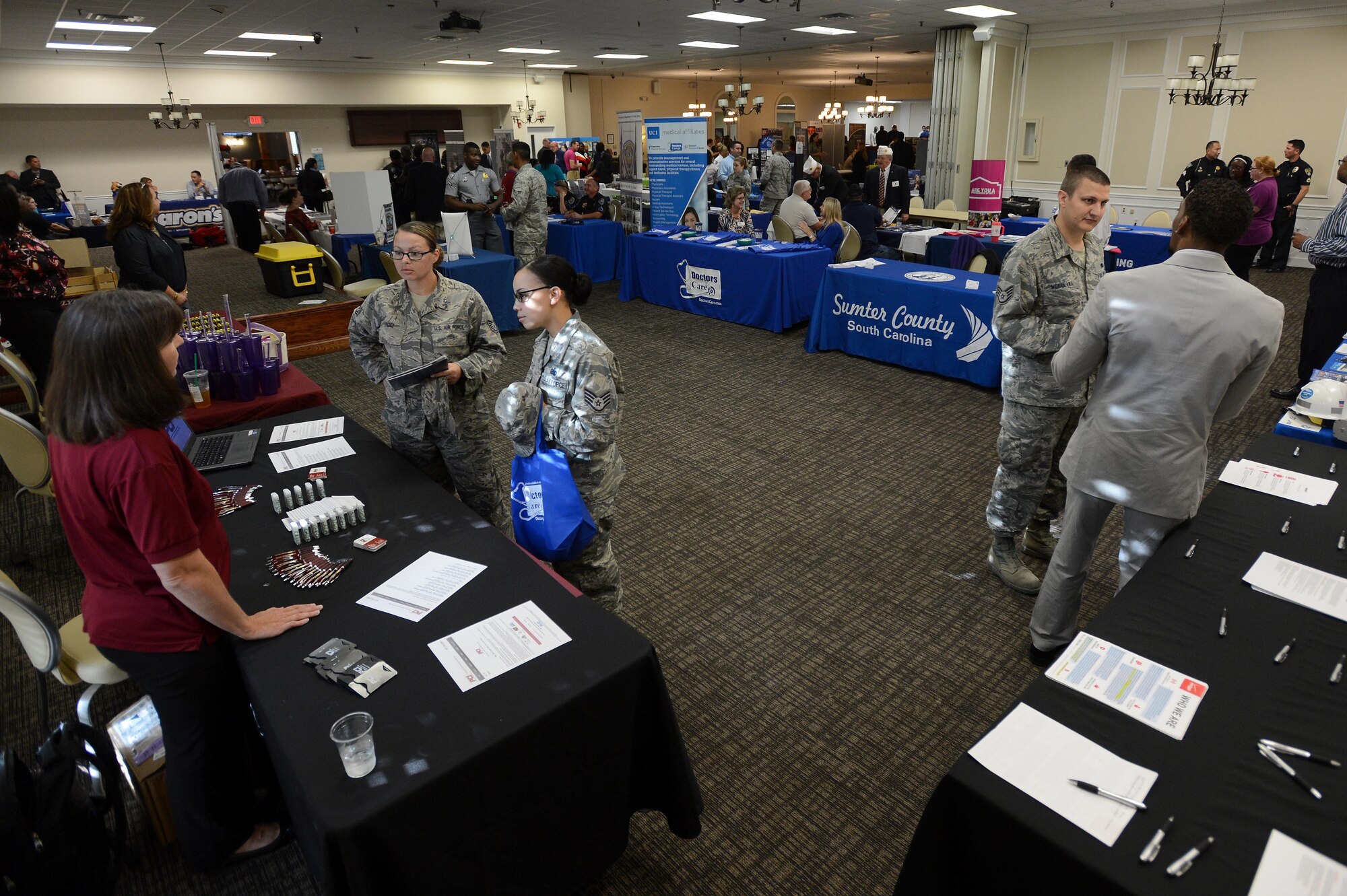 Team Shaw members speak with representatives from local businesses and universities at the 20th Force Support Squadron’s annual Job and Education Fair at Shaw Air Force Base, S.C., Oct. 27, 2016. The goal of the fair is to connect job and education seekers with representatives from organizations in Sumter County to inform them about education opportunities and the job market in the local area. (U.S. Air Force photo by Senior Airman Zade Vadnais)