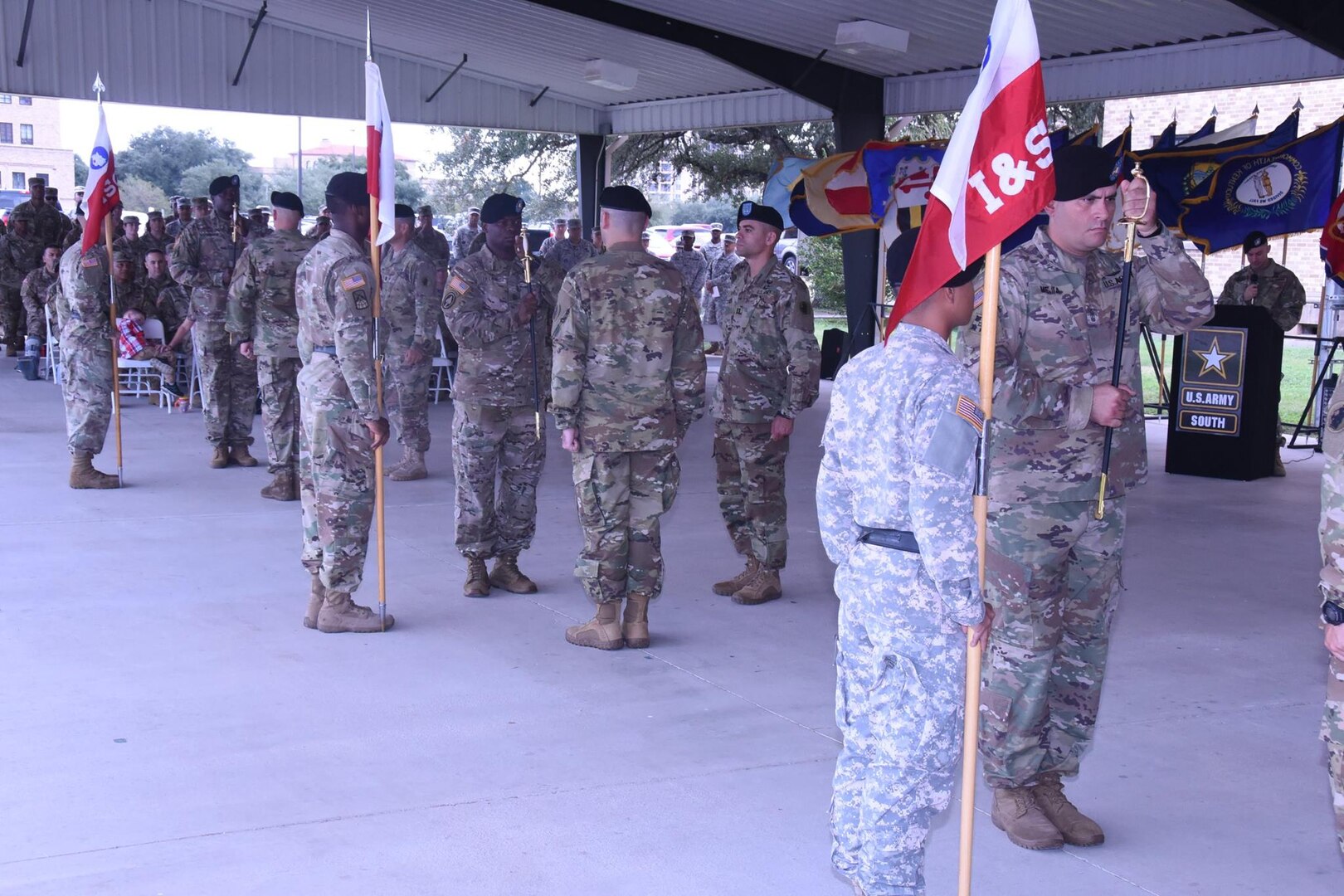 Incoming U.S. Army South Headquarters and Headquarters Battalion first sergeants are (from left) Jeff Edey, Operations Company; Eric Irish, Headquarters Support Company; and Beau Kempe, Intelligence and Sustainment Company at the Oct. 20 triple-company change of responsibility ceremony near the Army South headquarters at Joint Base San Antonio-Fort Sam Houston. 
