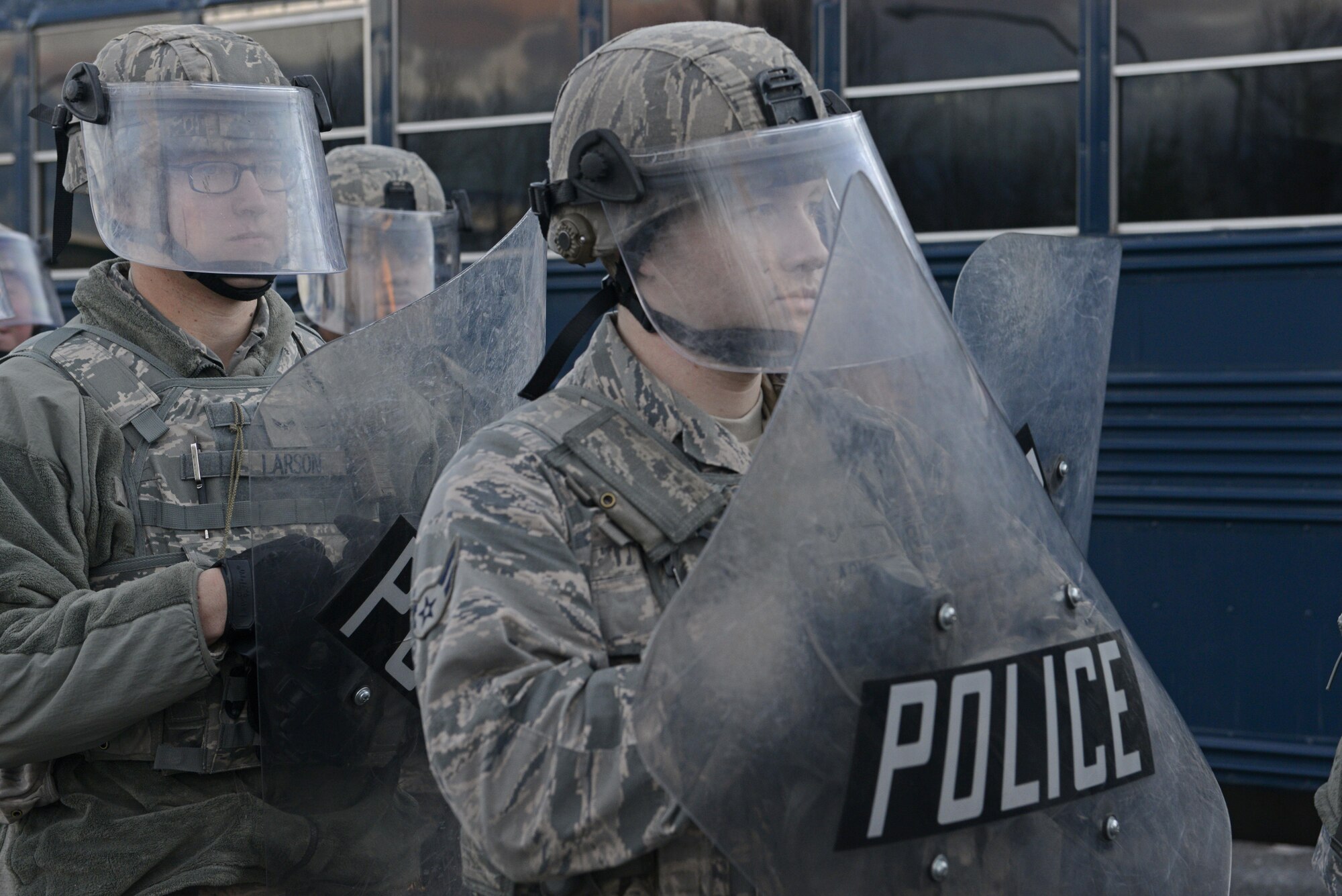 Joint Base Elmendorf-Richardson security forces personnel perform security operations during a simulated protest as part of exercise Polar Force 17-1 at JBER, Alaska, Nov. 1, 2016. The simulated protest began as a peaceful demonstration which escalated, resulting in a few aggressive protesters being detained and turned over to local law enforcement. The exercise tests the base's ability to integrate, mobilize, and prepare assigned personnel, aircraft and equipment for a wartime mission and to employ forces and weapons systems. 
