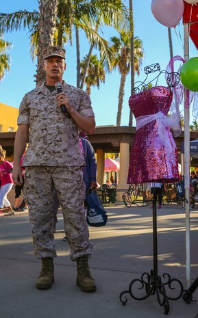 Colonel Mark M. Tull, chief of staff, Marine Corps Recruit Depot San Diego/Western Recruiting Region, gives the opening remarks at the Make a Difference Day event at MCRD San Diego, Oct. 22. The event was held to raise awareness for breast cancer and domestic violence. Booths for resources, activities and entertainment were set up to increase volunteerism among everyone.