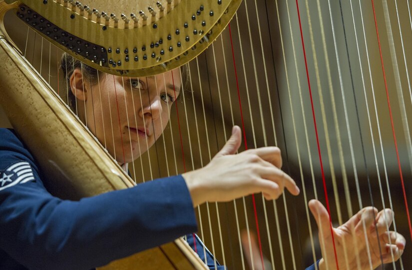 Tech. Sgt. Gréta Asgeirsson, U.S. Air Force Band harpist, plays her instrument during a Fall 2016 Tour performance in Youngstown, Pa., Oct. 27, 2016. The band’s tour began Oct. 20 in Cincinnati and ended in Pittsburgh after 10 days of performing. (U.S. Air Force photo by Senior Airman Jordyn Fetter)