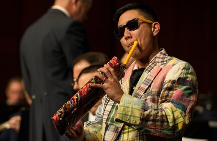Master Sgt. Benjamin Park, U.S. Air Force Band bass vocalist, plays a melodica during a Fall 2016 Band performance in Midland, Pa., Oct. 28, 2016. Park played this instrument to the song “Sixteen Tons,” popularized by Tennesssee Ernie Ford in 1955, that narrated the life of a coal miner. This was one of many songs during the performance sung by the Singing Sergeants, the official chorus of the U.S. Air Force Band. (U.S. Air Force photo by Senior Airman Jordyn Fetter)