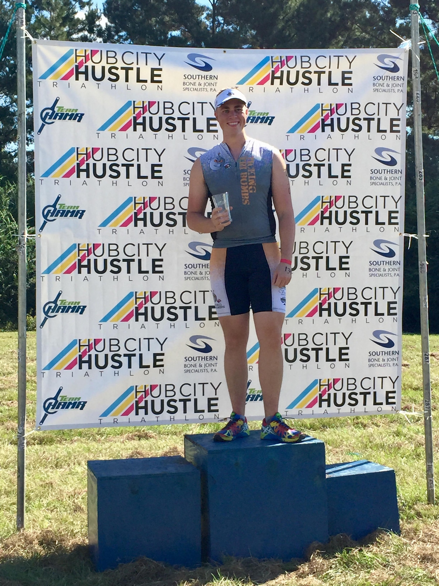 U.S. Air Force Staff Sgt. Jason Parker, 325th Aerospace Medical Squadron medical service craftsman, smiles after completing the Hub City Hustle Triathlon hosted in Hattiesburg, Miss., Oct. 8, 2014. Parker won the military division of the triathlon. He has run in triathlons for three years and has discovered a correlation with the difficulty of the activity and accomplishing things in his personal and professional life. (Courtesy photo)