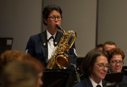 Tech. Sgt. Carolyn Braus, U.S. Air Force Band baritone saxophonist, plays her instrument during a Fall 2016 Tour performance in Pittsburgh, Oct. 29, 2016. Braus was one of a few soloists who were highlighted during various performances throughout the tour. (U.S. Air Force photo by Senior Airman Jordyn Fetter)