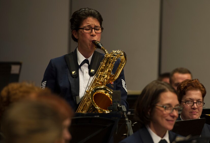 Tech. Sgt. Carolyn Braus, U.S. Air Force Band baritone saxophonist, plays her instrument during a Fall 2016 Tour performance in Pittsburgh, Oct. 29, 2016. Braus was one of a few soloists who were highlighted during various performances throughout the tour. (U.S. Air Force photo by Senior Airman Jordyn Fetter)