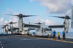 Sailors signal to pilots of MV-22B Ospreys, assigned to the Flying Tigers of Marine Medium Tiltrotor Squadron (VMM) 262, on the flight deck of amphibious assault ship USS Bonhomme Richard (LHD 6), Oct. 27, 2016.  Bonhomme Richard, flagship of the Bonhomme Richard Expeditionary Strike Group, is operating in the East China Sea in support of security and stability in the Indo-Asia Pacific region. 