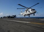A Japanese MCH-101 airborne mine countermeasures helicopter carrying Vice Adm. Hiroshi Yamamura, commander, Fleet Escort Force, and Rear Adm. Tatsuya Fukuda, commander, Escort Flotilla 4, lands on the flight deck of the Navy’s only forward-deployed aircraft carrier, USS Ronald Reagan (CVN 76) for the start of Exercise Keen Sword 2017 (KS17). Ronald Reagan is participating in Exercise KS17, a joint, bilateral field-training exercise involving U.S. military and Japan Self-Defense Force personnel designed to increase the combat readiness and interoperability of the Japan-U.S. alliance. 