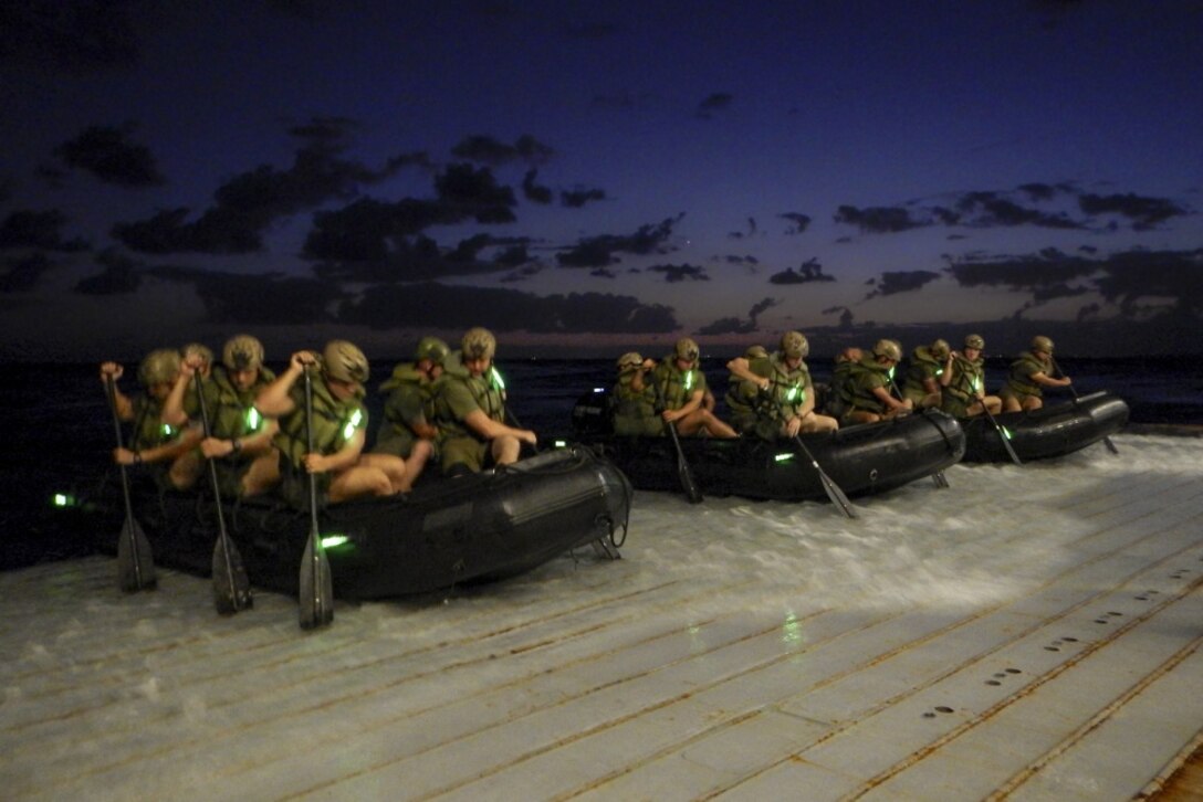 USS GREEN BAY (LPD-20), At Sea, (Aug. 29, 2016)– Marines assigned to Company F, Battalion Landing Team, 2nd Battalion, 4th Marines, 31st Marine Expeditionary Unit use combat rubber raiding craft to conduct a launch and recovery exercise from the well deck of the USS Green Bay (LPD-20), at sea, Aug. 29, 2016. The 31st MEU is task-organized to address a wide variety of military operations in the Asia-Pacific region, from force projection and maritime security to humanitarian assistance and disaster relief. (U.S. Marine Corps photo by Cpl. Darien J. Bjorndal, 31st Marine Expeditionary Unit/ Released) 