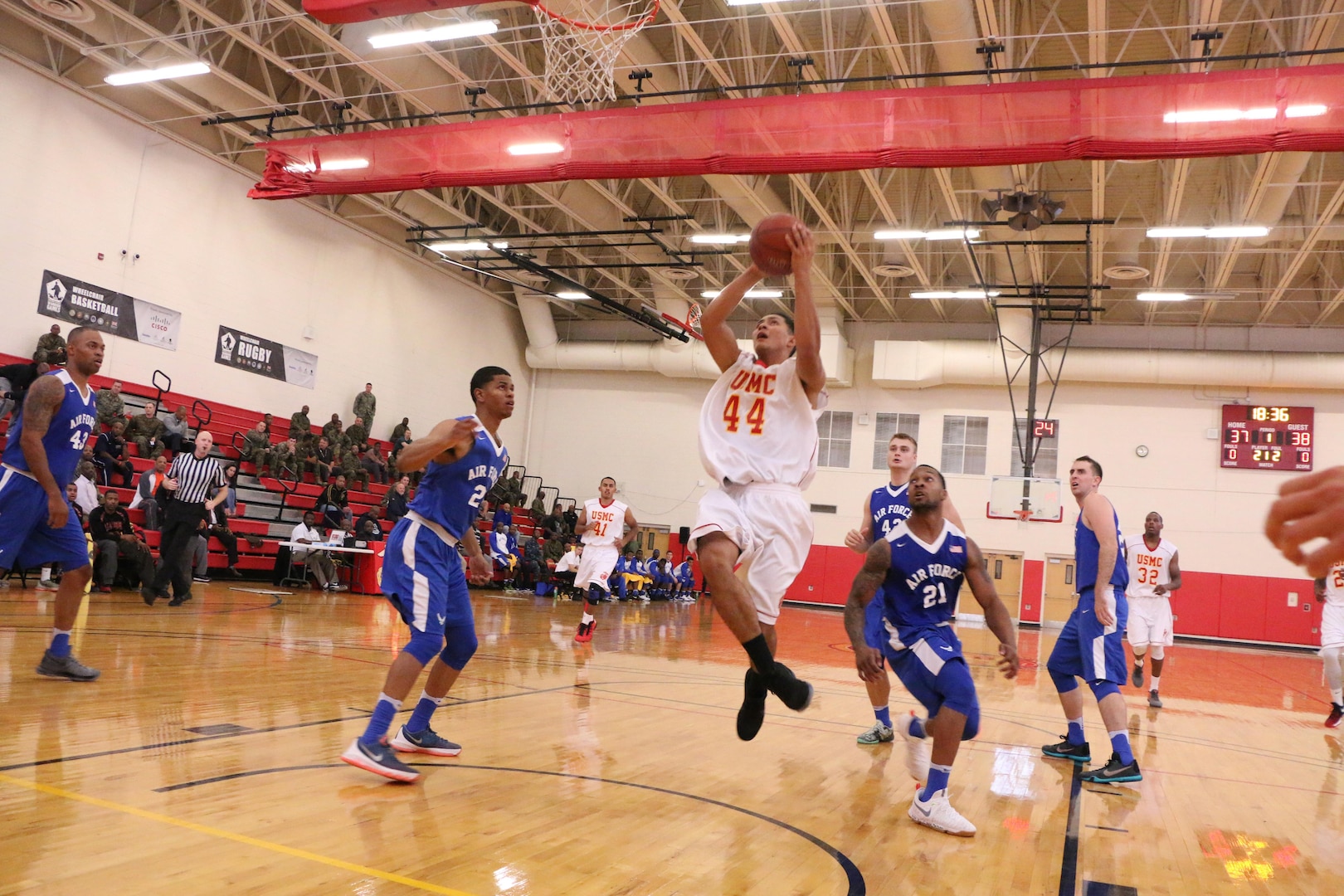 Marine Fernie Morelos drives the net during the 2016 Armed Forces Men's Basketball Championship held at MCB Quantico, Va. from 1-7 November.  Air Force won the first contest 66-62 over the Marines.  The best two teams during the doubel round robin will face each other for the 2016 Armed Forces crown.  