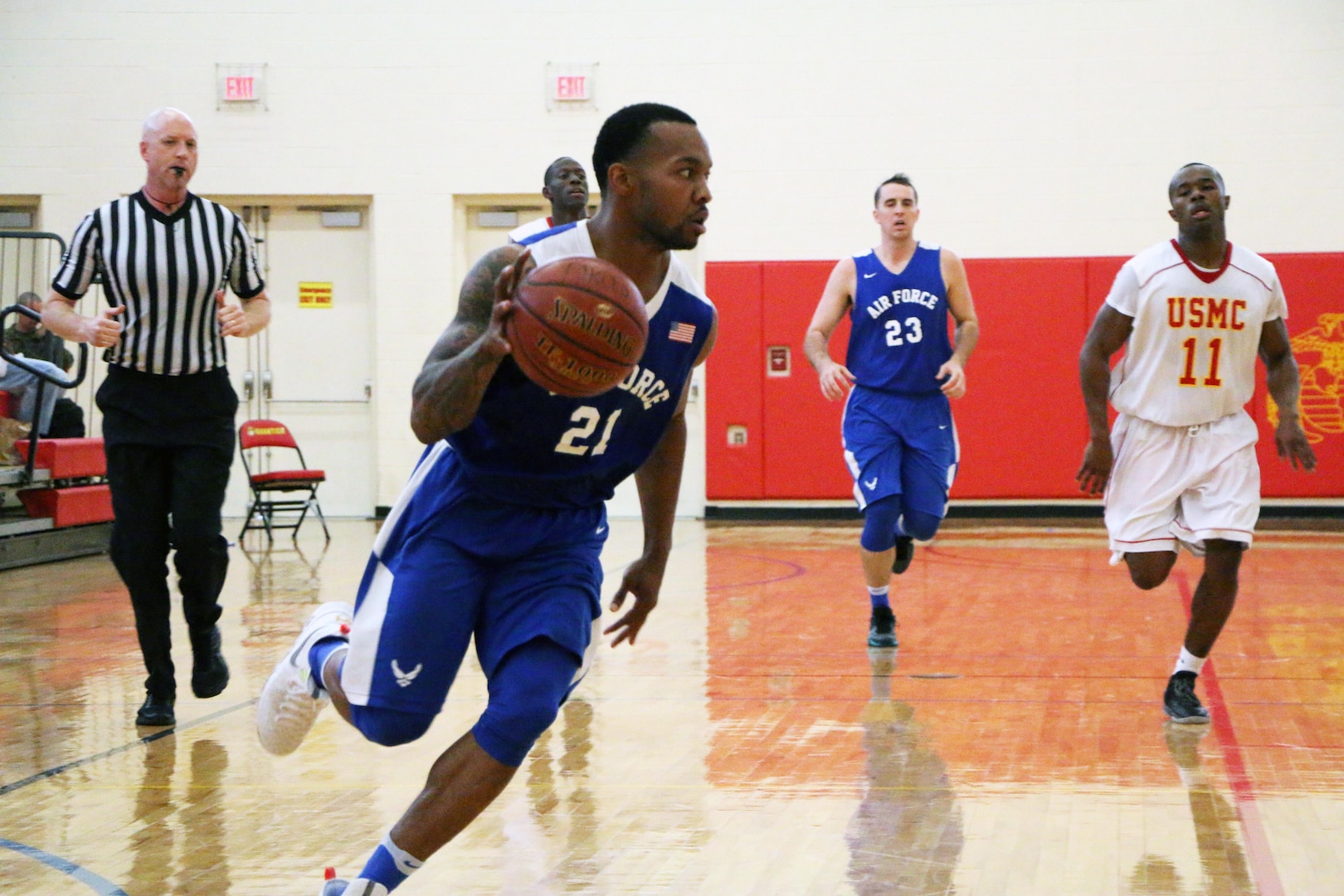 Senior Airman Daveon Allen of Nellis AFB, Nevada drives the lane during the 2016 Armed Forces Men's Basketball Championship held at MCB Quantico, Va. from 1-7 November.  Air Force won the first contest 66-62 over the Marines.  The best two teams during the doubel round robin will face each other for the 2016 Armed Forces crown.  