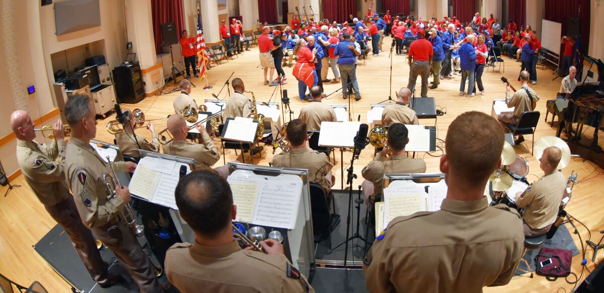 Dozens of Honor Flight veterans and family members took to the dance floor to dance to period pieces performed by the Airmen of Note,