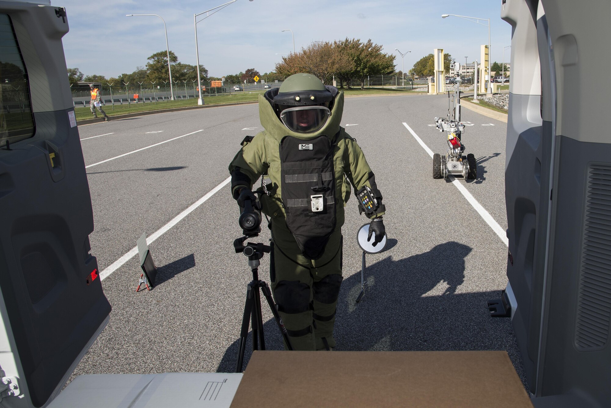 Staff Sgt. J. J. Hargrove, 436th Civil Engineer Squadron explosive ordnance disposal journeyman, approaches a simulated suspected vehicle-borne radiological device Oct. 26, 2016, at the south gate on Dover Air Force Base, Del. Team Dover’s emergency responders rallied together to maintain protective cordons, monitor radiation levels and establish decontamination measures during the exercise. (U.S. Air Force photo by Senior Airman Aaron J. Jenne)