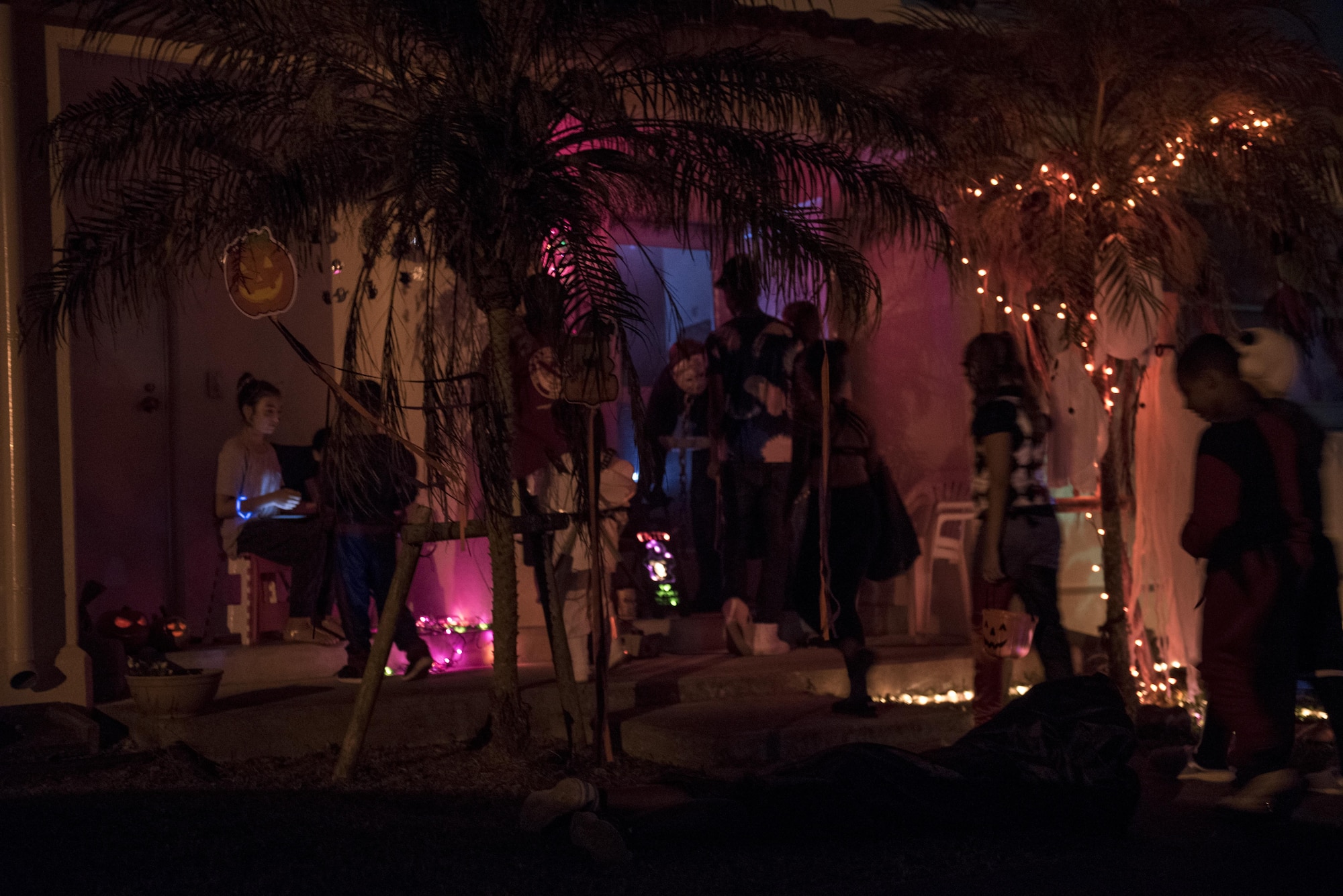 American and Okinawan families trick or treat during Halloween Oct. 31, 2016, on Kadena Air Base, Japan. Kadena AB invited local families to trick-or-treat on base during the holiday. (U.S. Air Force photo by Senior Airman Omari Bernard/Released)