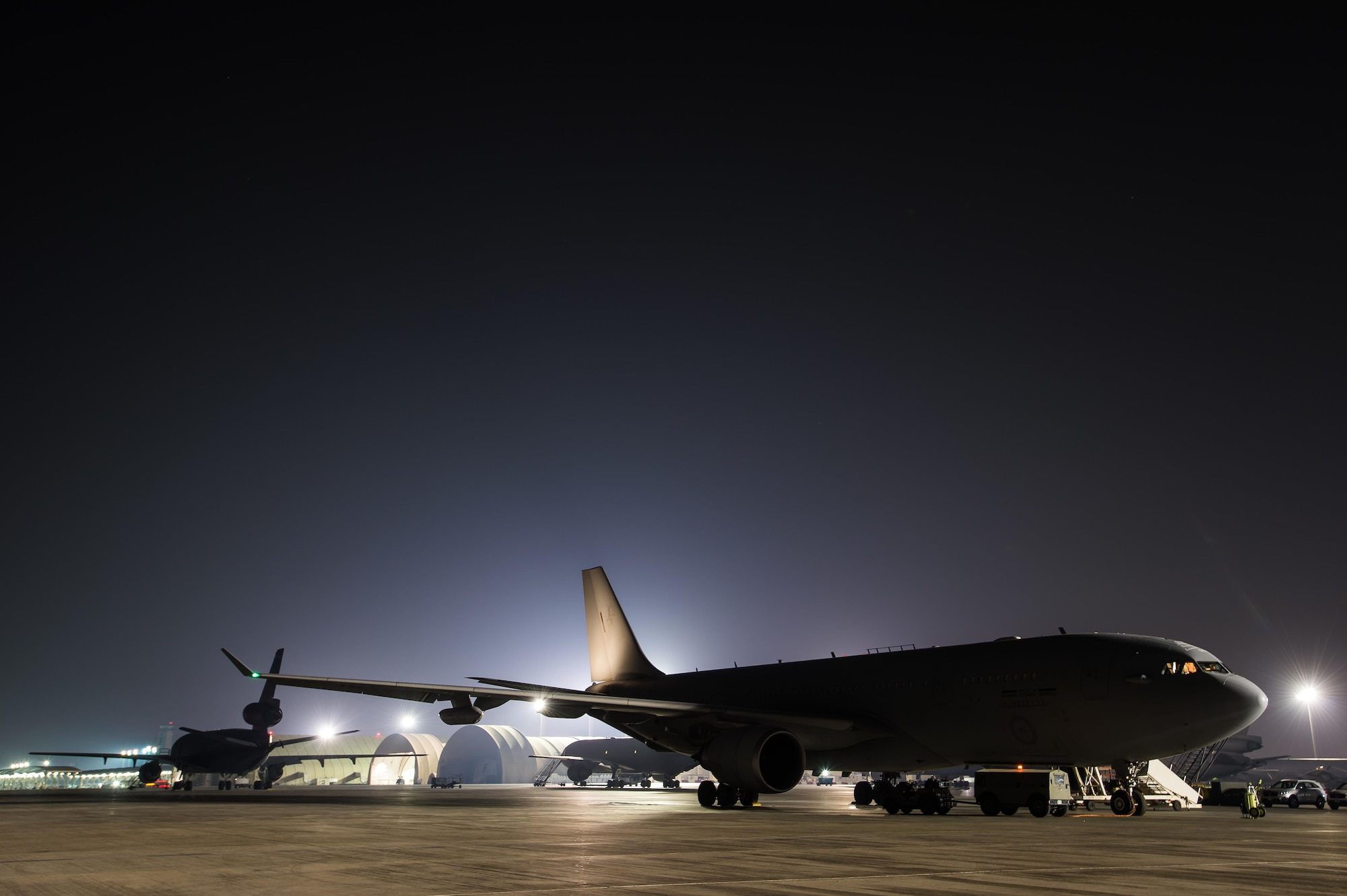 A Royal Australian Air Force KC-30A is prepped for a formation departure with a U.S. Air Force KC-10 Extender from an undisclosed location in Southwest Asia, Oct. 24, 2016. This is the first time U.S. and RAAF air refueling platforms have flown in formation together. The combined refuelers were capable of delivering more than 576,000 pounds of fuel to coalition aircraft supporting the liberation of Mosul, Iraq. (U.S. Air Force photo by Senior Airman Tyler Woodward)