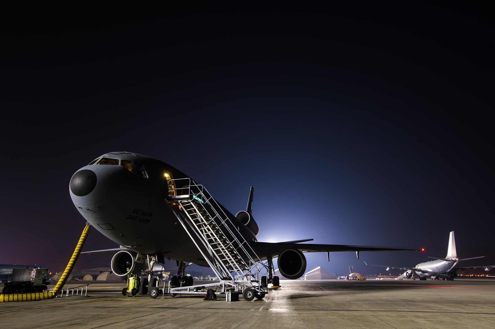 A U.S. Air Force KC-10 Extender is prepped for take off in a formation departure with a Royal Australian Air Force KC-30 from an undisclosed location in Southwest Asia, Oct. 24, 2016. For the first time ever, the two air forces completed a formation departure. Another example of the devloping relationships among coalition forces contributing to the liberation of the city of Mosul, Iraq. (U.S. Air Force photo by Senior Airman Tyler Woodward)