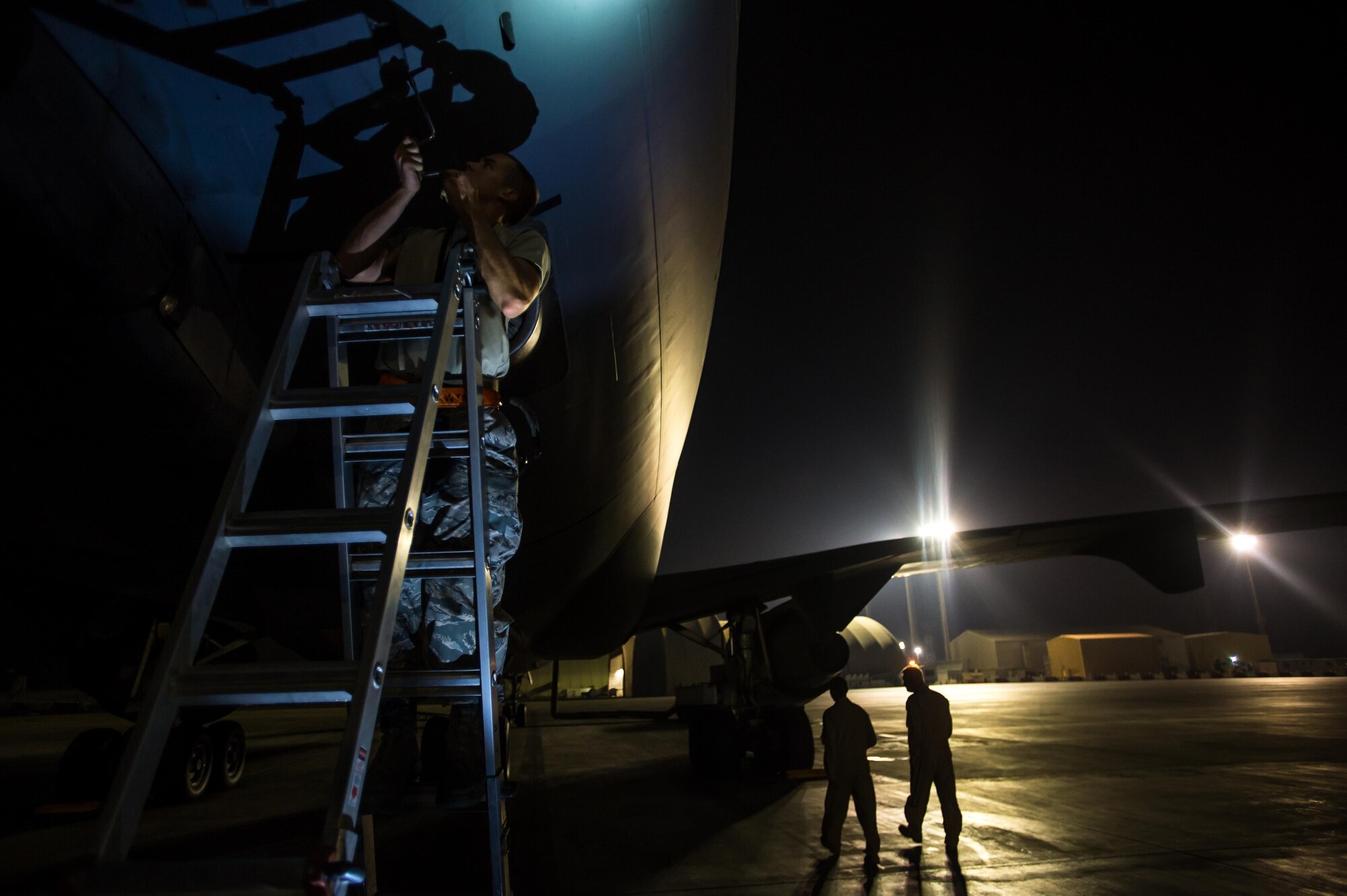 A KC-10 Extender crew chief completes a pre-flight inspection before take off from an undisclosed location in Southwest Asia, Oct. 24, 2016. Although the KC-10 is primarily serving as a refueler in Operation Inherent Resolve, it also has the capabilities to transport litter patients and ambulatory patience in support of aeromedical evacuations. (U.S. Air Force photo by Senior Airman Tyler Woodward)