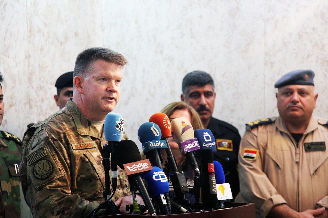 U.S. Air Force Col. John Dorrian, Combined Joint Task Force - Operation Inherent Resolve spokesman, addresses the media during a joint press conference at Makhmur, Iraq, Nov. 1, 2016. Reporters were updated about the ongoing operations in the fight against ISIL. (U.S. Army photo by Spc. Ian Ryan)