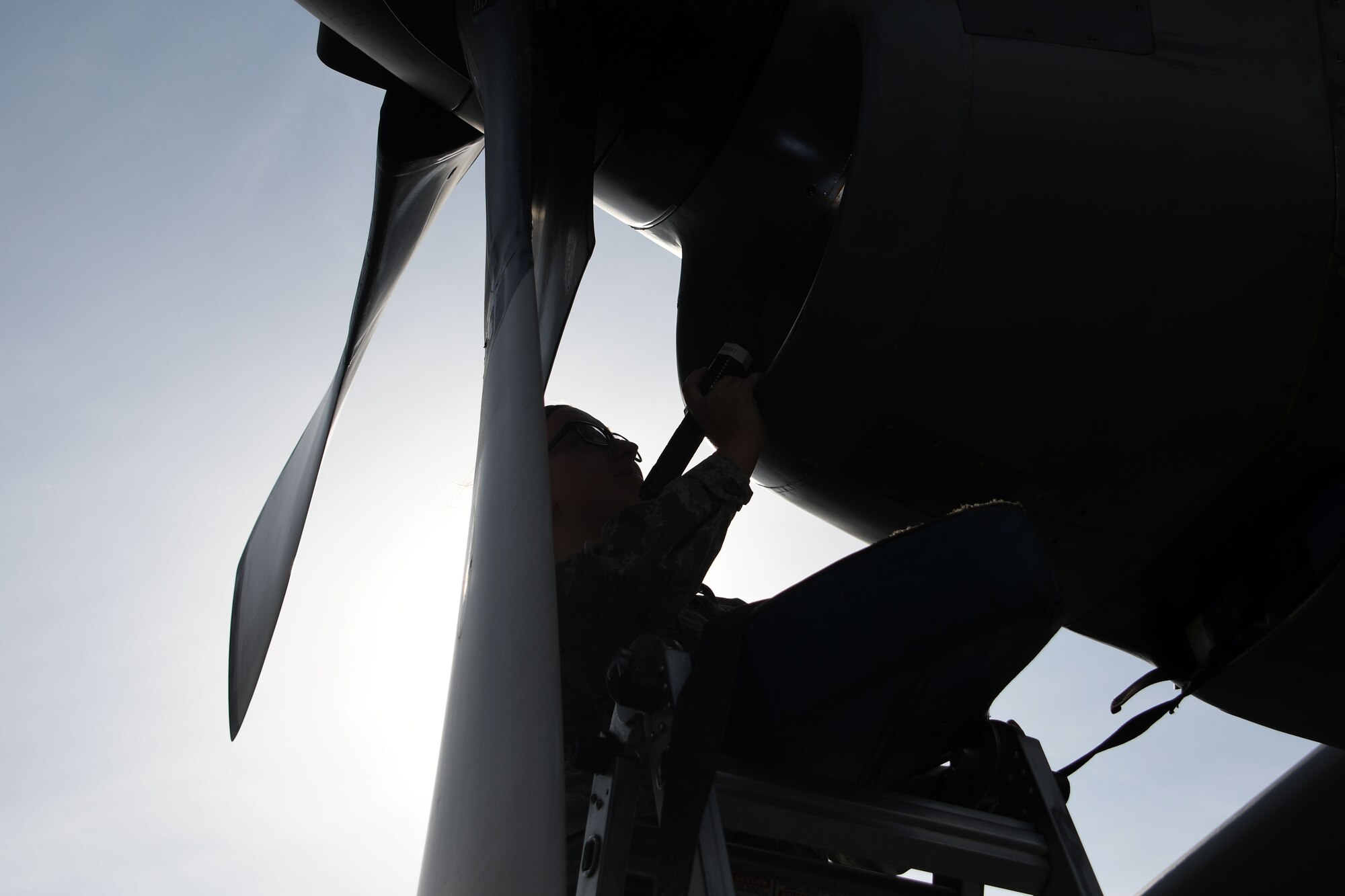 Senior Airman Colleen Sweeney-Marple, a 386th Expeditionary Aircraft Maintenance Squadron assistant dedicated crew chief, inspects an EC-130 Compass Call at an undisclosed location in Southwest Asia Nov. 1, 2016. Senior Airman Colleen Sweeney-Marple is deployed from the 755th Aircraft Maintenance Squadron at Davis-Monthan Air Force Base, Ariz. (U.S. Air Force photo by Senior Airman Andrew Park/Released)