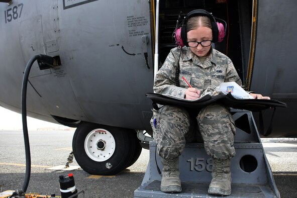 Senior Airman Colleen Sweeney-Marple, a 386th Expeditionary Aircraft Maintenance Squadron assistant dedicated crew chief, examines a checklist at an undisclosed location in Southwest Asia Nov. 1, 2016. Senior Airman Colleen Sweeney-Marple is deployed from the 755th Aircraft Maintenance Squadron at Davis-Monthan Air Force Base, Ariz. (U.S. Air Force photo by Senior Airman Andrew Park/Released)