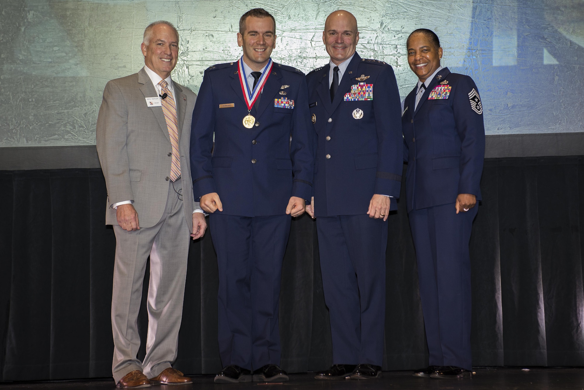 U.S. Air Force Capt. William Burrows, 314th Airlift Wing flying training unit instructor pilot, receives the Airlift/Tanker Young Leadership Award at the annual Airlift/Tanker Association conference held Oct. 27 - 30, 2016 at Nashville, Tenn.  Burrows managed 389 crew members in Fiscal Year 2016 and facilitated flight training for 10 international students. (Courtesy Photo)