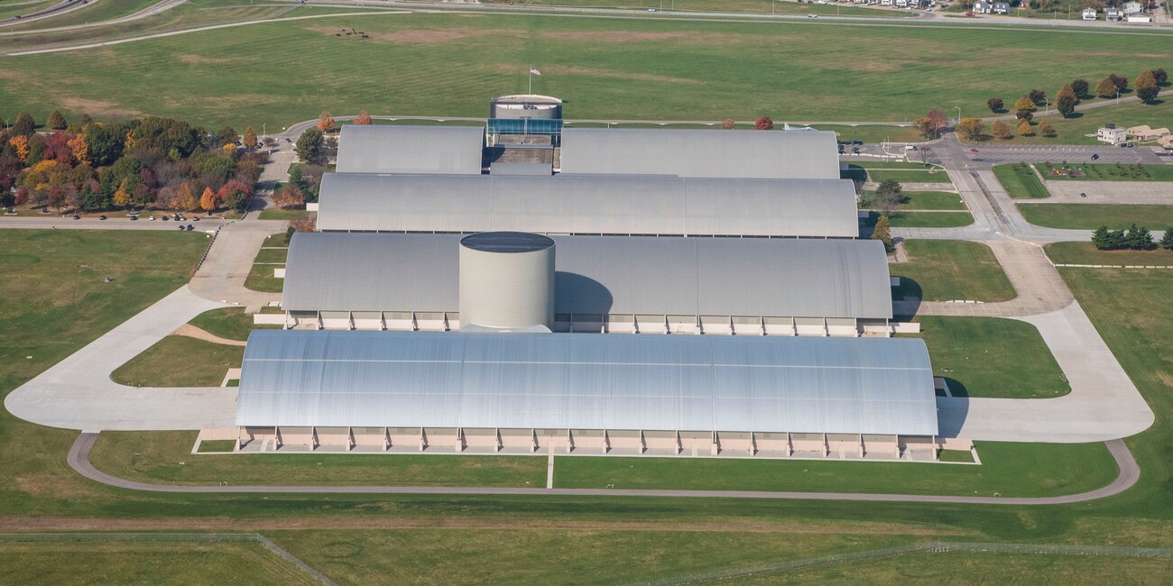 DAYTON, Ohio (11/2016) -- Aerial view of the National Museum of the U.S. Air Force. The museum collects, researches, conserves, interprets and presents the Air Force's history, heritage and traditions, as well as today's mission to fly, fight and win...in Air, Space and Cyberspace to a global audience through engaging exhibits, educational outreach, special programs, and the stewardship of the national historic collection. (U.S. Air Force photo by Ken LaRock, pilot Matt Kiefer)