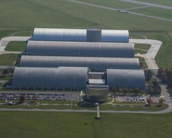 DAYTON, Ohio (11/2016) -- Aerial view of the National Museum of the U.S. Air Force. The museum collects, researches, conserves, interprets and presents the Air Force's history, heritage and traditions, as well as today's mission to fly, fight and win...in Air, Space and Cyberspace to a global audience through engaging exhibits, educational outreach, special programs, and the stewardship of the national historic collection. (U.S. Air Force photo by Ken LaRock, pilot Matt Kiefer)
