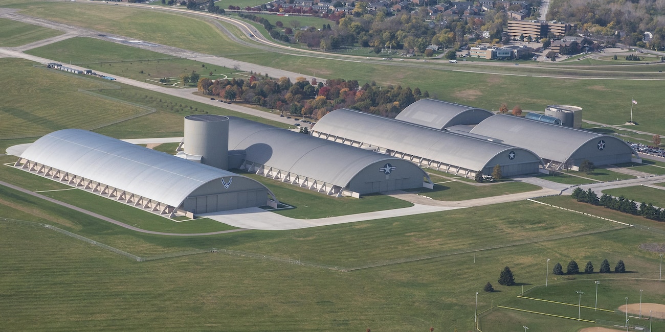 DAYTON, Ohio (11/2016) -- Aerial view of the National Museum of the U.S. Air Force. The museum collects, researches, conserves, interprets and presents the Air Force's history, heritage and traditions, as well as today's mission to fly, fight and win...in Air, Space and Cyberspace to a global audience through engaging exhibits, educational outreach, special programs, and the stewardship of the national historic collection. (U.S. Air Force photo by Ken LaRock, pilot Matt Kiefer)