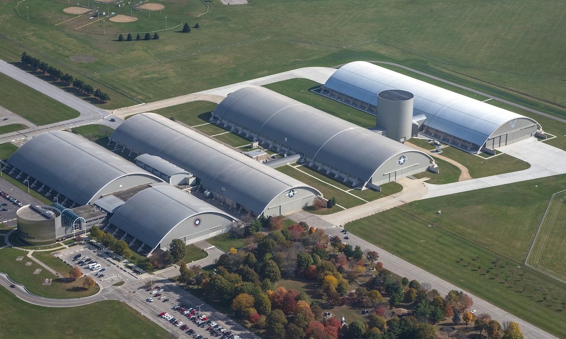 DAYTON, Ohio (11/2016) -- Aerial view of the National Museum of the U.S. Air Force. The museum collects, researches, conserves, interprets and presents the Air Force's history, heritage and traditions, as well as today's mission to fly, fight and win...in Air, Space and Cyberspace to a global audience through engaging exhibits, educational outreach, special programs, and the stewardship of the national historic collection. (U.S. Air Force photo by Ken LaRock, pilot Matt Kiefer)