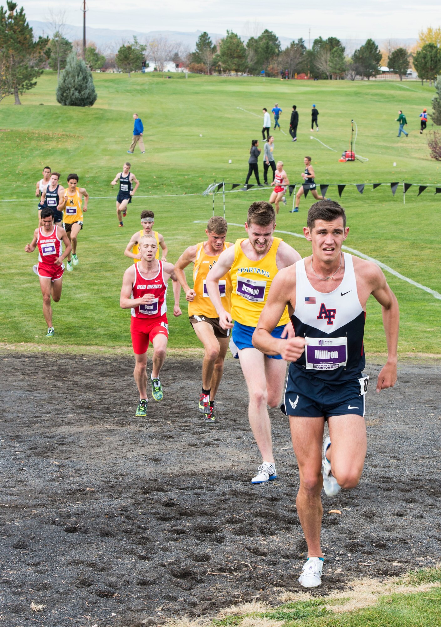 Cadet Andrew Milliron runs up a hill in the Mountain West Conference Championship Oct. 28, 2016, at the Falcon Crest Golf Club in Kuna, Idaho. Milliron placed 29th overall out of 66 runners in the eight-kilometer course in 25 minutes, 2.30 seconds. (U.S. Air Force photo by Airman 1st Class Chester Mientkiewicz/Released)