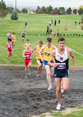 Cadet Andrew Milliron runs up a hill in the Mountain West Conference Championship Oct. 28, 2016, at the Falcon Crest Golf Club in Kuna, Idaho. Milliron placed 29th overall out of 66 runners in the eight-kilometer course in 25 minutes, 2.30 seconds. (U.S. Air Force photo by Airman 1st Class Chester Mientkiewicz/Released)