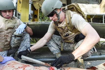 Staff Sgt. Cassandra Bayerl, student and paramedic with the 59th Medical Wing, prepares an epinephrine shot for a simulated patient during the Paramedic Recertification Course on Joint Base San Antonio-Lackland, Texas, Sept. 19, 2016. Students underwent five days of didactic and two days of field training exercises. (U.S. Air Force photo/Staff Sgt. Michael Ellis)