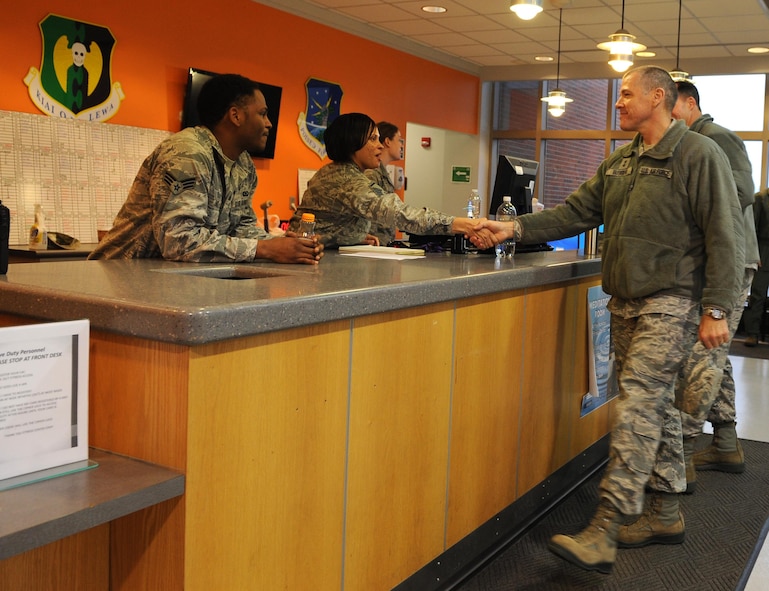 Maj. Gen. Thomas A. Bussiere, 8th Air Force commander, visits with members of the 5th Force Support Squadron at Minot Air Force Base, N.D., Oct. 30, 2016, during exercise Global Thunder 17. Global Thunder is an annual training event that assesses command and control functionality in all USSTRATCOM mission areas and affords component commands a venue to evaluate their joint operational readiness.